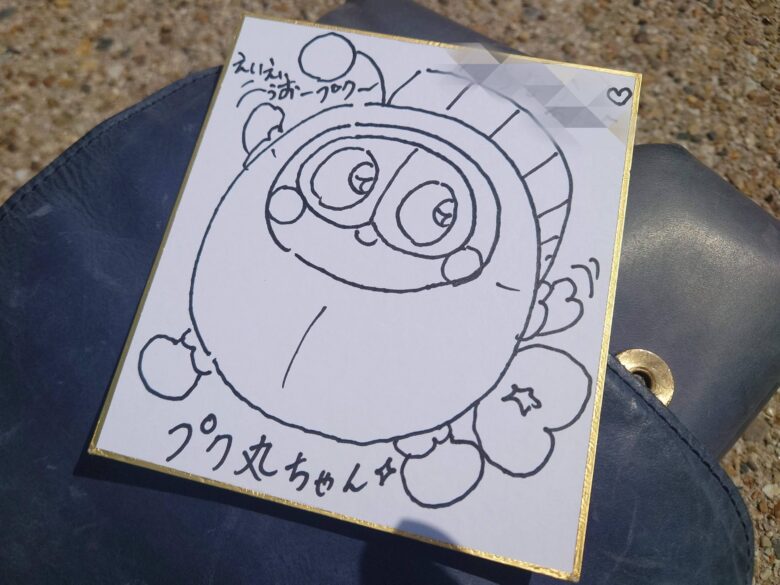 ご当地キャラEXPOinりんくう2025でプク丸が敷地に描いたサイン
