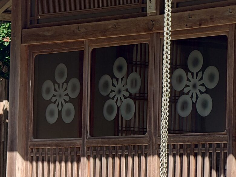 正覺院のマーク